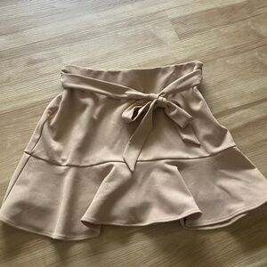 Tan ruffled mini skirt